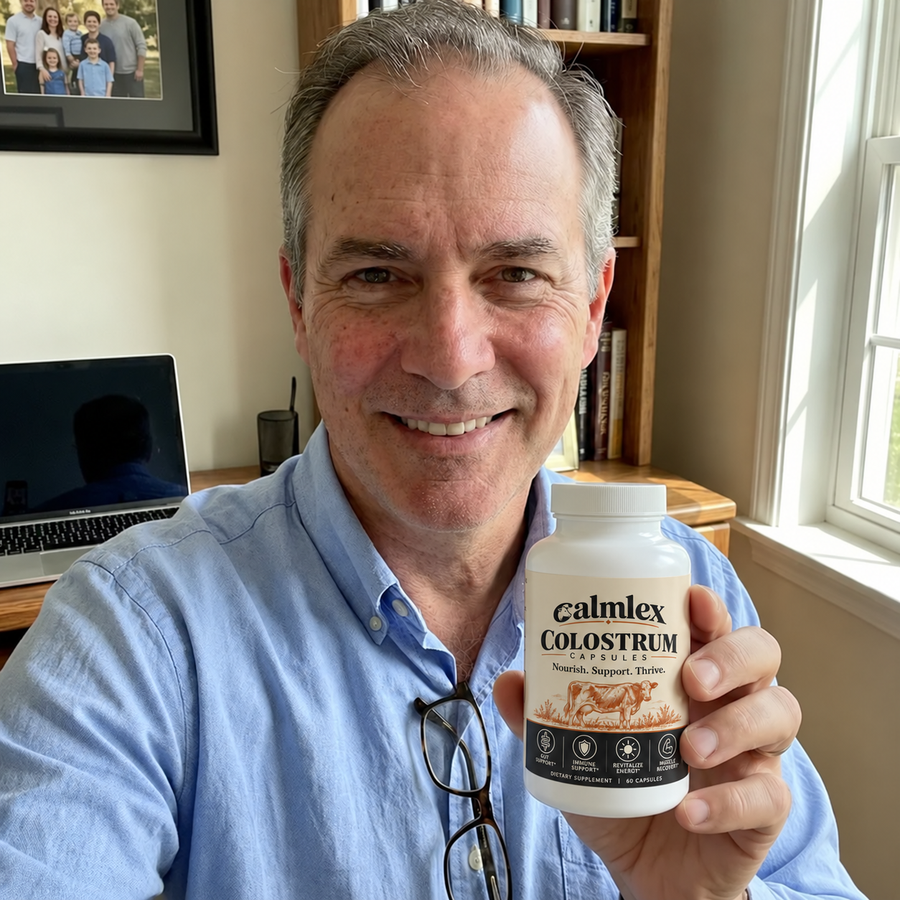 Illustrative photo of a man holding Calmlex colostrum capsules in a gym
